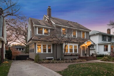 Driveway with adjacent brick patio and walk way