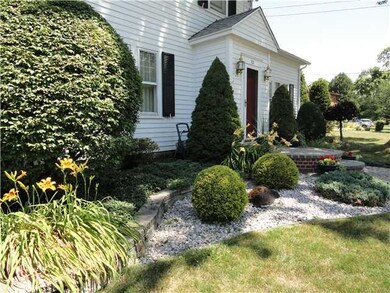 Exterior Front. Gorgeous gardens and landscaping..