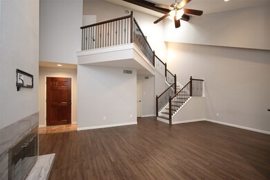 The Family Room features high ceilings, beautiful