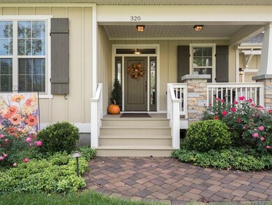 Inviting Entry - Brick paving front walk and drive
