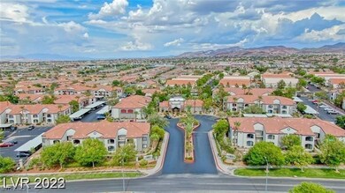 Aerial view of residential area with a mountainous background