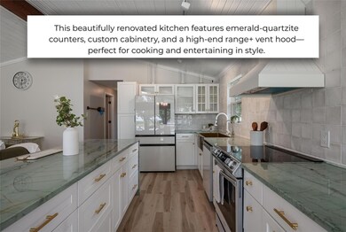 Kitchen with stainless steel appliances, light wo