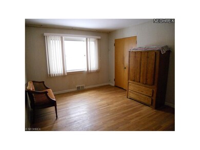 Bedroom #2 with Hardwood Floors with Connecting Fu