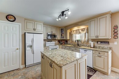 Custon cabinetry and granite countertops. Applianc