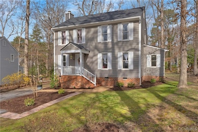 View of front facade featuring covered porch and a