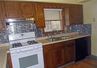 Appliances stay in the kitchen, including new gas 