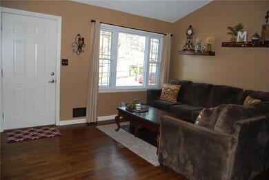 Living Room note gleaming wood floors