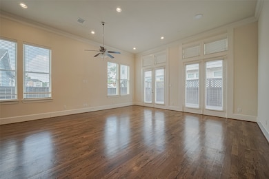 HUGE DEN...OPEN FLOOR PLAN....WOODEN FLOORS & FAN.
