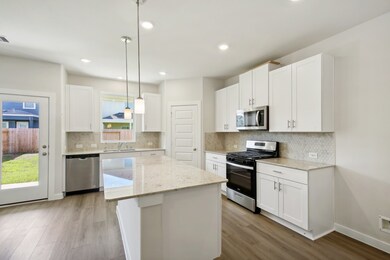 Photo is not of the actual home, but is an inspirational photo of builder’s model home and may depict options, furnishings, and/or decorator features that are not included
