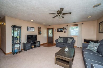 This view of the living room highlights the plenti