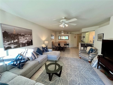 Tiled living room with ceiling fan