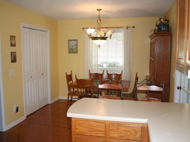 Separate dining area, pantry on left, back enrtance to right. Spacious kitchen is 11x19.