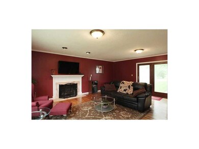 Living Room. It also has doors to the backyard. No
