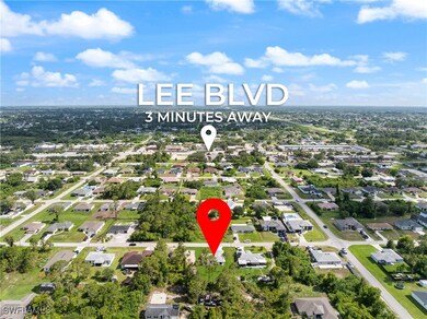 Aerial view of property and surrounding area with