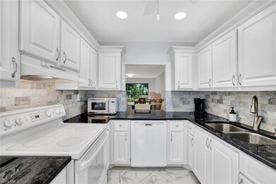 1055 Forest Lakes Dr unit F203, Naples, FL 34105 - photo 4