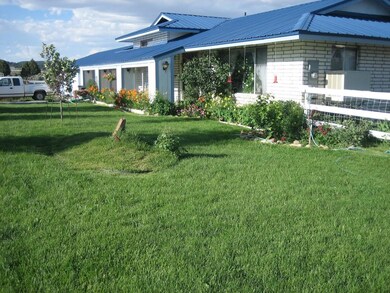 SW Front with Flowers-owners pic
