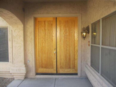 4028 E. Robin Ln Double Front Wood Doors