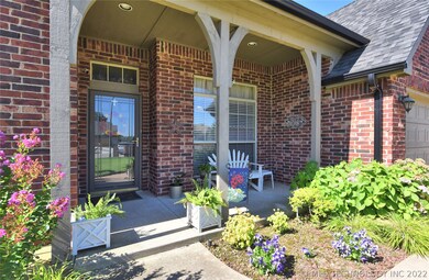 The covered front porch is inviting and provides a