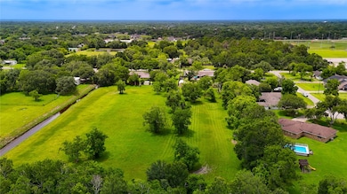 Four acres of serene living! A rare gem in the Cit