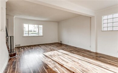 Living room and dining area from kitchen entry