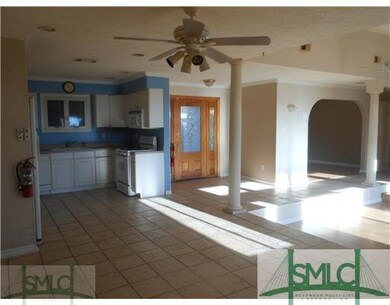 Kitchen. Kitchen, Entry Foyer and Open Arched Way 