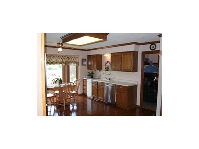 Kitchen with Bay window. Wood floors stainless ste
