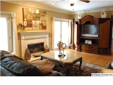 3rd view of den with fireplace