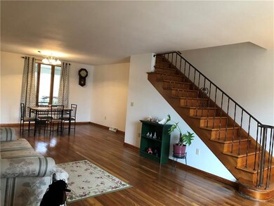 Large Living room and dining room with open stairc