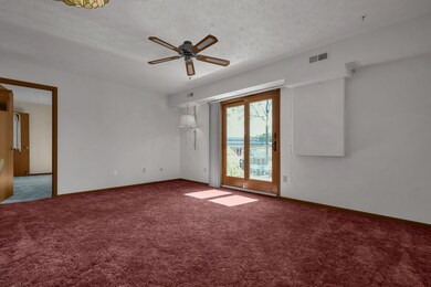 Living/Dining Areas lead to Balcony.