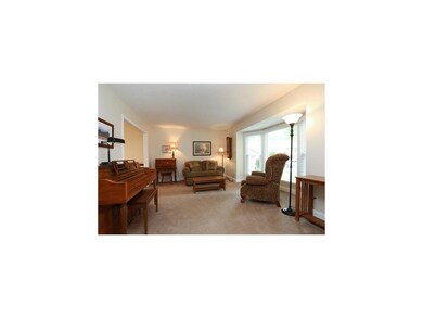 Living room from entry.  Note bay window.