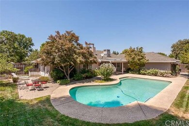 This lovely back yard has it all: Pool, fenced are