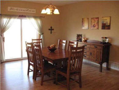 Large dining area with sliding glass doors to the 