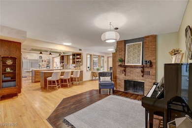 Living room featuring light wood-type flooring and