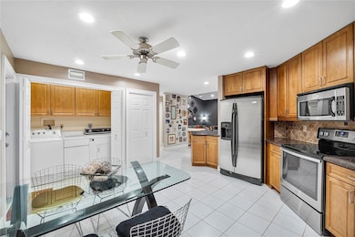 washer /dryer in air conditioning instead of garag