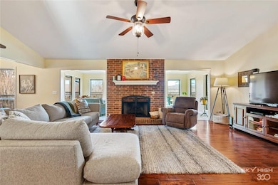Beautiful brick fireplace in living room with tons
