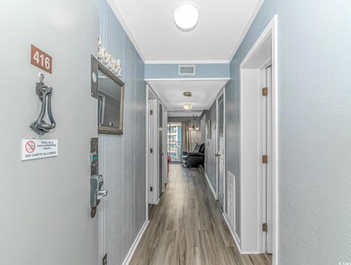 Corridor with wood finished floors