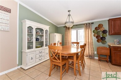 Dining room with tile floors.