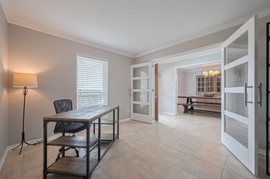 Spacious first-floor home office with French doors