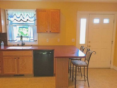 Kitchen. Kitchen counter, pull up a stool and talk