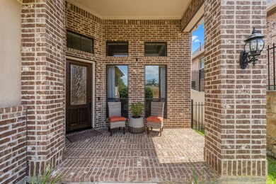 Front porch with charming brickwork.