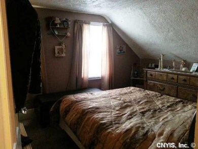 Bedroom. The first bedroom upstairs features newer