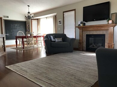 Great living room with wood laminate floors and a 