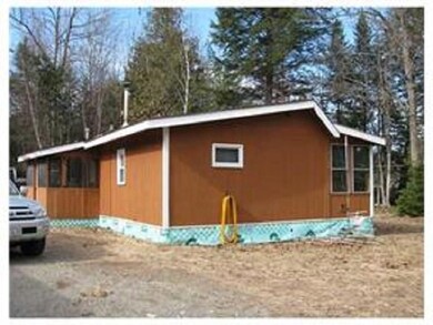 Side view of the cabin, a screened...