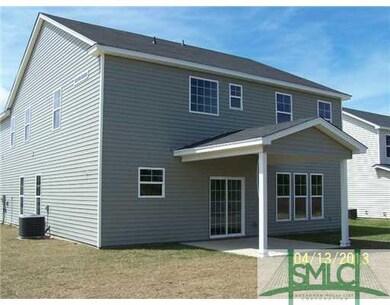 Exterior Back. Check out the covered back porch!  