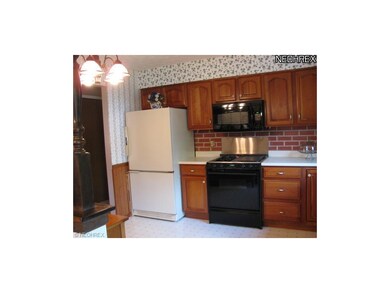 Kitchen view 1 shows beautiful solid wood cherry c