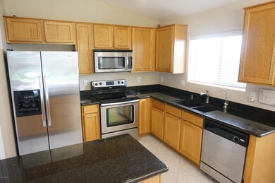 Kitchen with Stainless Steel Package