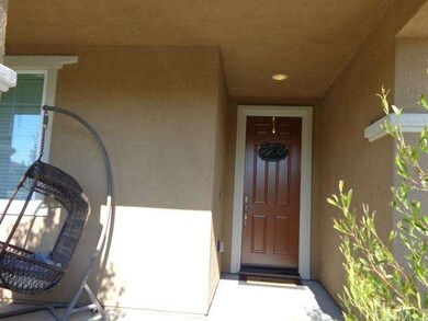 Walk past your front porch to your front door. Pri