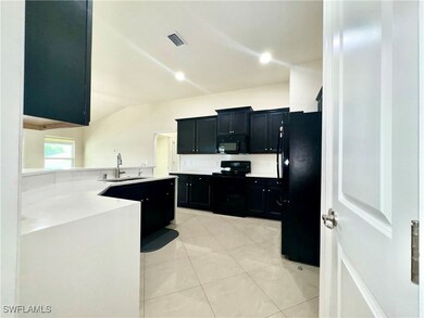 2103 NE 4th Place, Cape Coral, FL 33909 - photo 5
