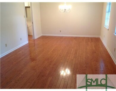 Living Room. Beautiful hardwood floors in the livi