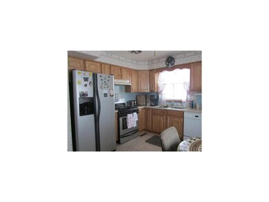 Kitchen. Updated cabinets and flooring.